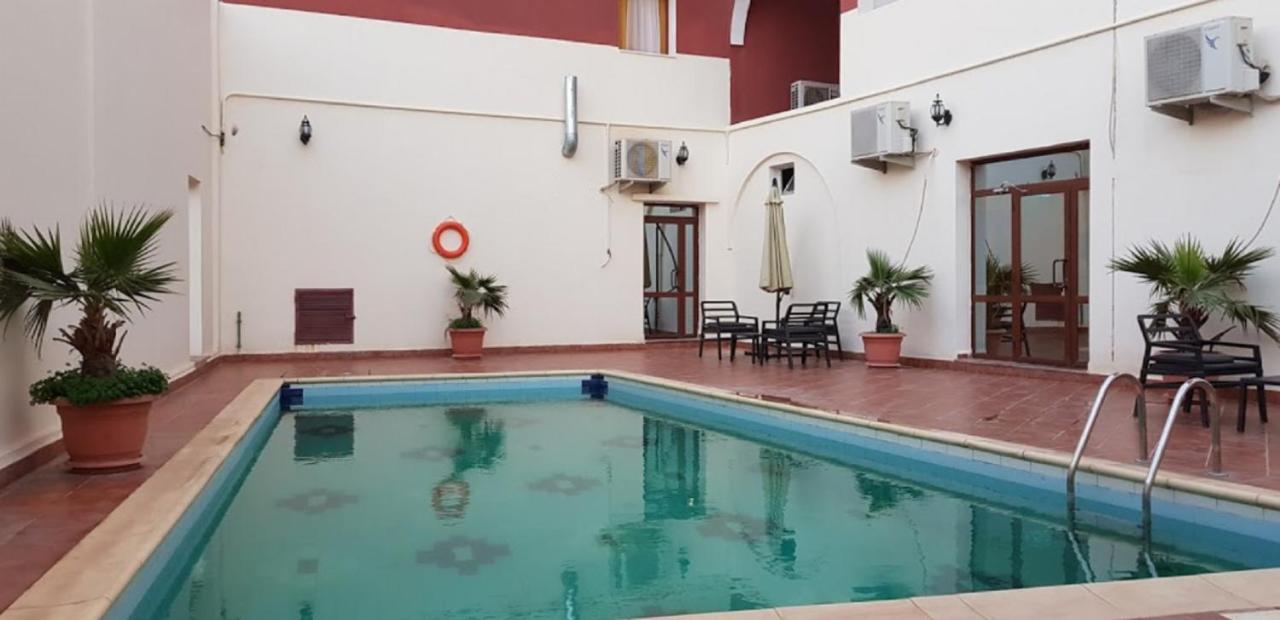 Takialt Hotel Adrar Bagian luar foto